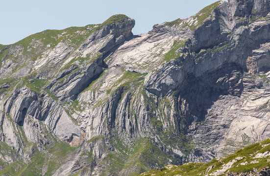 Geological fold overthrust of limestone rocks formed in the swiss alps near leukerbad