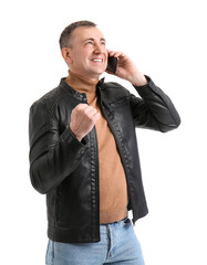 Fototapeta premium Excited man celebrating success during phone call, business communication and achievement, isolated on white background