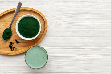 Fototapeta na wymiar Green Latte with Spirulina algae powder, dietary supplement for vegan