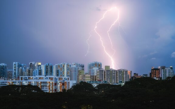 Mesmerizing Lighting Storm over a housing block in Singapore