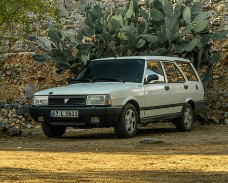 Old Tofas car in field
