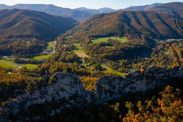 Aerial shot of Seneca Rocks in West Virginia with fall foliage.