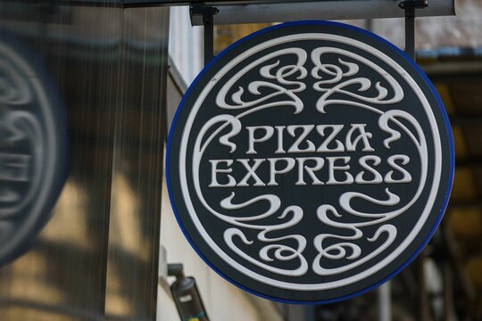 Pizza Express sign outside restaurant in London