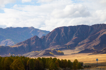 Autumn landscape with views of mountains, forest, rivers at sunrise and sunset