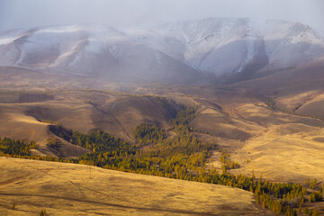 Fototapeta premium Autumn landscape with views of mountains, forest, rivers at sunrise and sunset