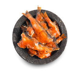 Bowl with canned fish in tomato sauce isolated on white background