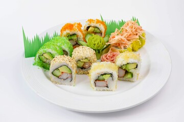 Closeup of sushi on a plate isolated on white