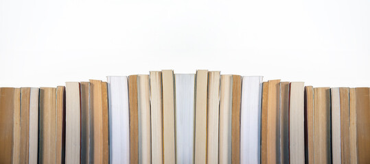 stack of books on white background.  side by side book. copy space fot text.