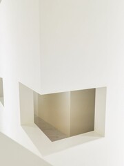 Vertical shot of the modern white interior of the Huamao Museum of Art Education in Ningbo, China