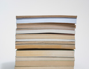 stack of books. abstract background with old books. side view.