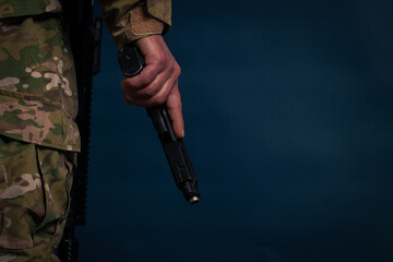 soldier aiming pistol and assault rifle