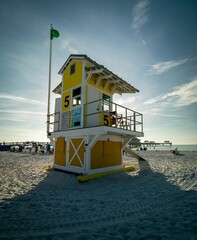 Vertical view of a lifeguard shack at a sandy beach, in Clearwater Florida