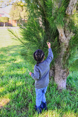 black African boy playing in the woods