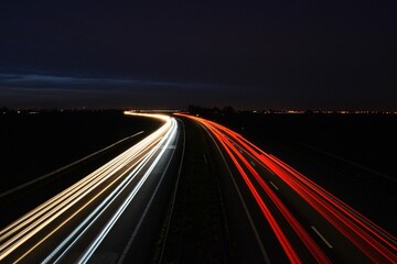 Fototapeta na wymiar Highway lights into the horizon