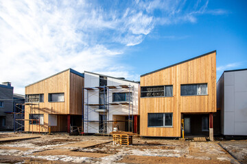 Modern barn house with a stylish exterior and facade. Concept of an eco-friendly house. Scandinavian style Barnhouse in the woods