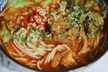 Closeup of Chongqing noodles in a bowl