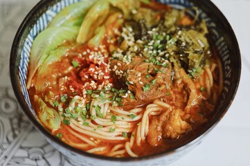 Closeup of Chongqing noodles in a bowl