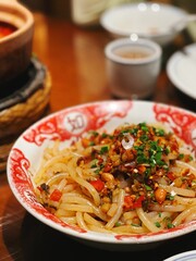 Closeup of Chinese noodles with topping