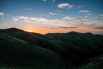 Aerial view of mountains at sunset