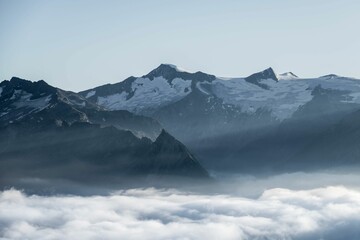 Aerial view of snow covered mountain landscape