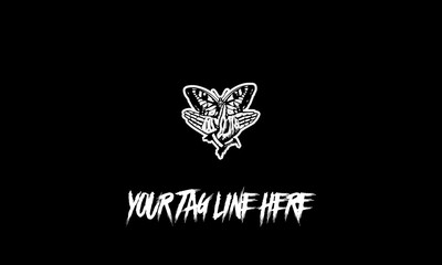 Fototapeta premium Editable vector logo of a butterfly with a face with a space for the tagline on a black background