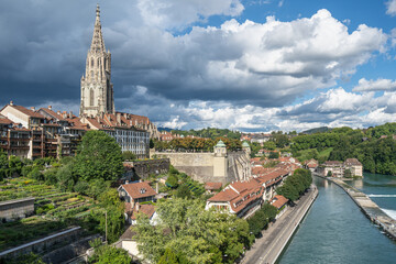Bern Old Town skyline along Aare River with the distinctive spire of Bern Cathedral, Switzerland
