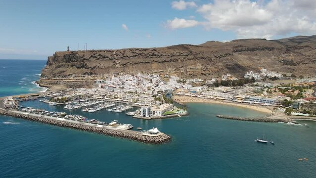 Aerial view of Puerto de Mogan harbor with ships in Gran Canaria, Spain