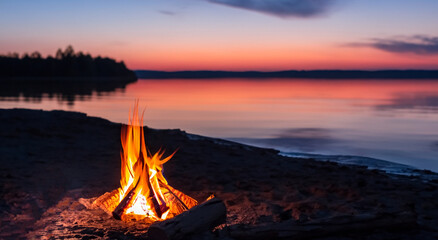 beautiful campfire in the middle of the beach at beautiful dull sunset