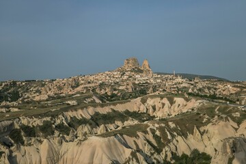 Beautiful view over the town of Uchisar, at the Pigeon Valley, Cappadocia, Turkey, on a sunny day