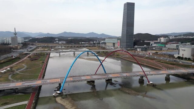 Aerial view of bridge over river in Daejeonin 4K