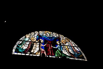 Close-up shot of stained glass inside the Duomo di Milano