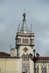 Fototapeta na wymiar Vertical of Sintra city hall on a sunny day with a cloudy sky in the background