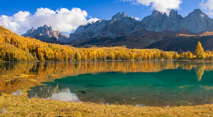beautiful fairytale landscape in autumn in europe with a big lake