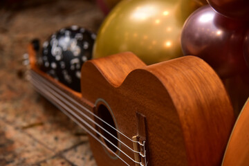 guitar and music, acoustic guitar and black balloon with musical notes, close up of a guitar,...