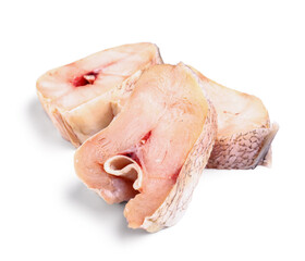 Pieces of raw codfish on white background
