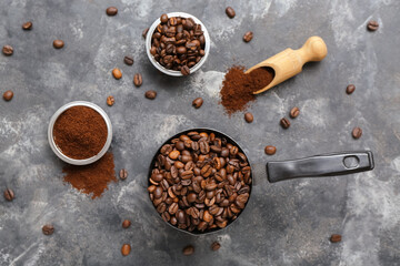 Coffee beans and powder on dark background