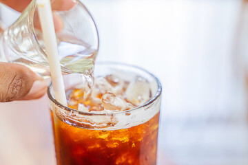 Black coffee, Americano in a cafe by the sea, Sue Flamingo, Ao Yon Beach, Phuket Thailand