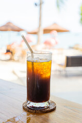 Black coffee, Americano in a cafe by the sea, Sue Flamingo, Ao Yon Beach, Phuket Thailand