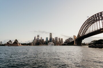 Naklejka premium Long bridge over the river in a city