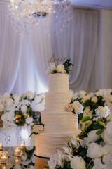 Vertical shot of a wedding cake at a restaurant