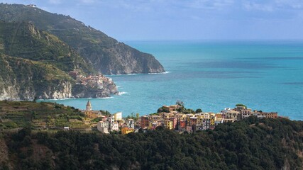 Fototapeta na wymiar Aerial view of modern buildings near the sea in Cinque Terre, Italy