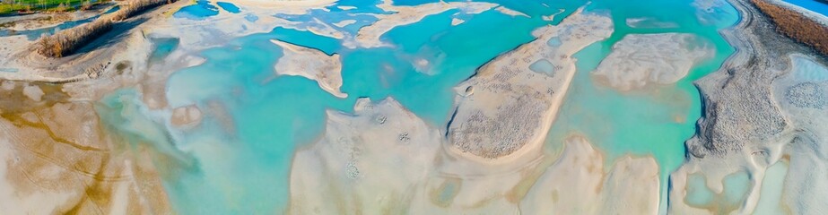 Aerial view of a stunning seascape with emerald green sea in Forggensee reservoir, Allgau
