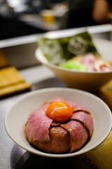Vertical closeup shot of Wagyu beef at a restaurant