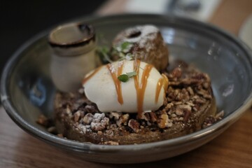 Chocolate dessert on a bowl with caramel