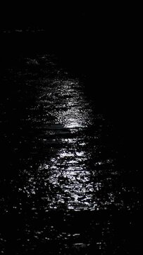 Closeup of rain drops crush on ground in night