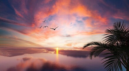 Panorama of sea sunrise, ocean sunrise, seascape. Romantic colorful sunset at the sea. The sun touches horizon. 