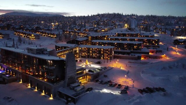 Drone view of the Mountain Resort in Trysil, Norway in winter at night - slow motion
