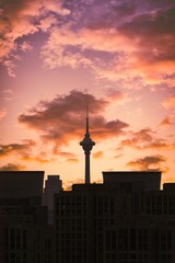 Obraz premium Image of a Tianjin TV Tower in the dark shadow during the red sunset