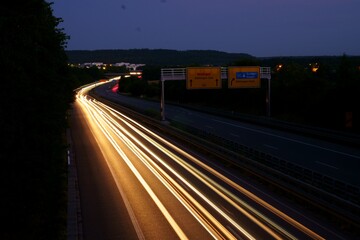 Long exposure shot of the car traffic on the road at night