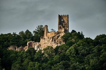 Horizontal shot of medieval Castle Drachenfels on a hill in the forest of Koenigswinter, Germany